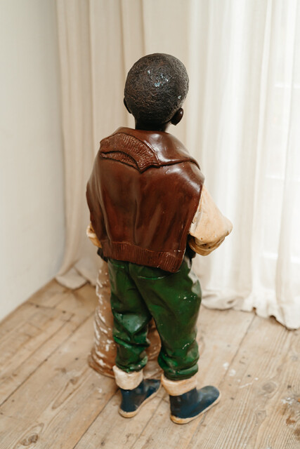 plaster sculpture of a handsome young boy ... 