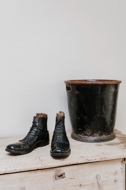 Pair of black leather giant shoes ... 