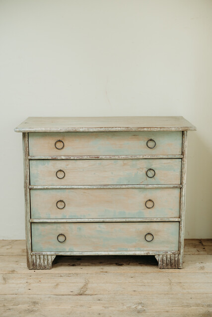 cedarwood/hazlenut twig chest of drawers .. rests of blue paint ..