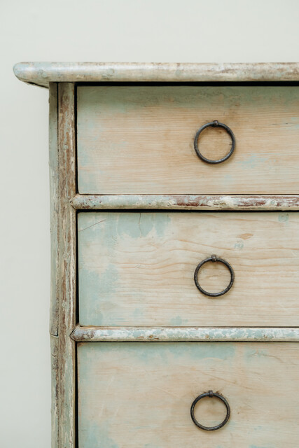 cedarwood/hazlenut twig chest of drawers .. rests of blue paint ..