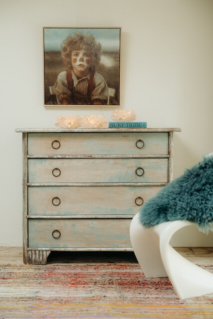 cedarwood/hazlenut twig chest of drawers .. rests of blue paint ..