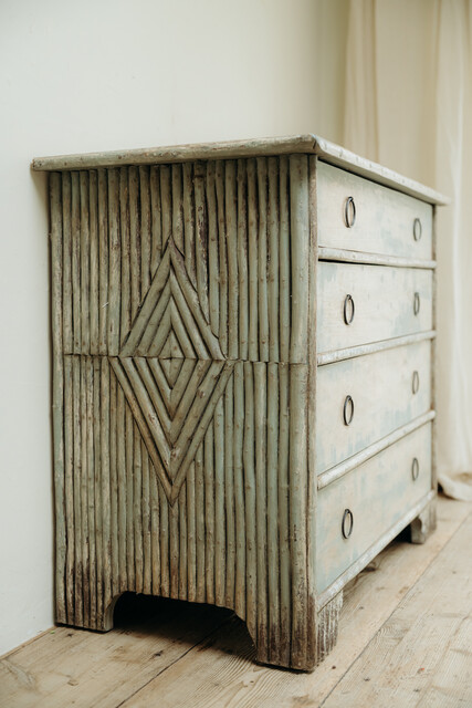 cedarwood/hazlenut twig chest of drawers .. rests of blue paint ..