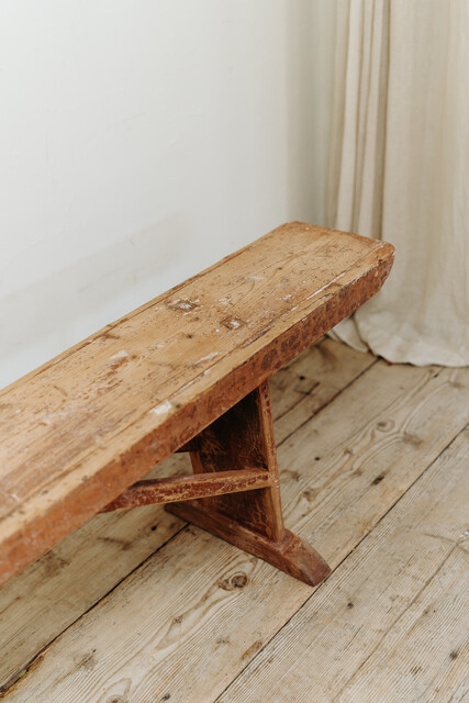extra large Swedish bench... rests of old red paint ...