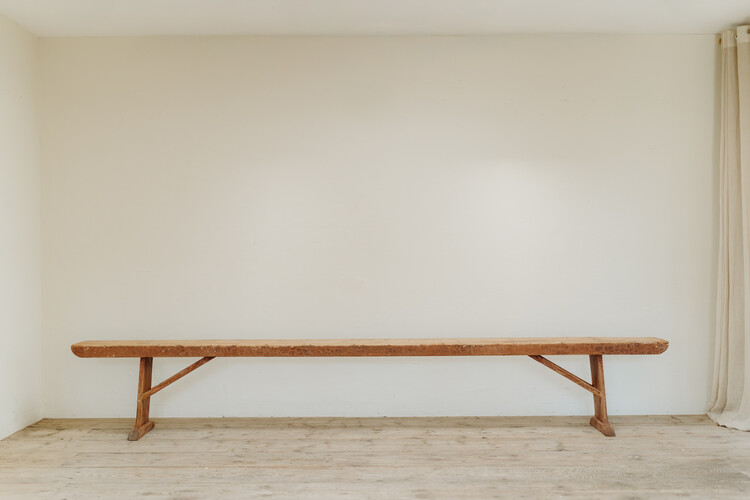 extra large Swedish bench... rests of old red paint ...