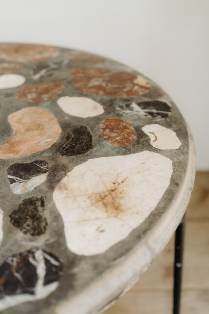 marbletopped iron table ... can be used indoors or outdoors...