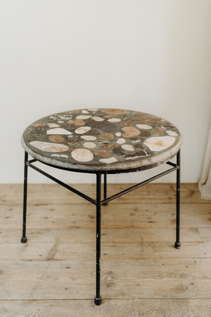 marbletopped iron table ... can be used indoors or outdoors...
