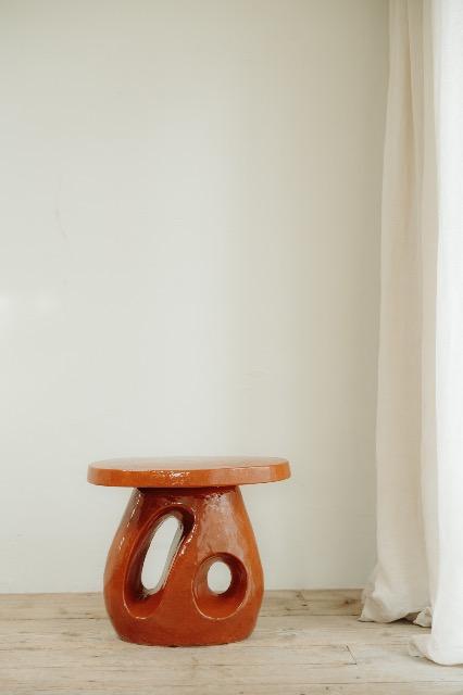 red glazed ceramic side table ...