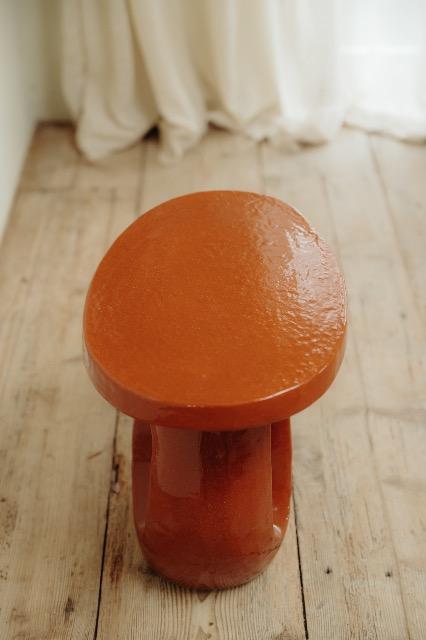 red glazed ceramic side table ...