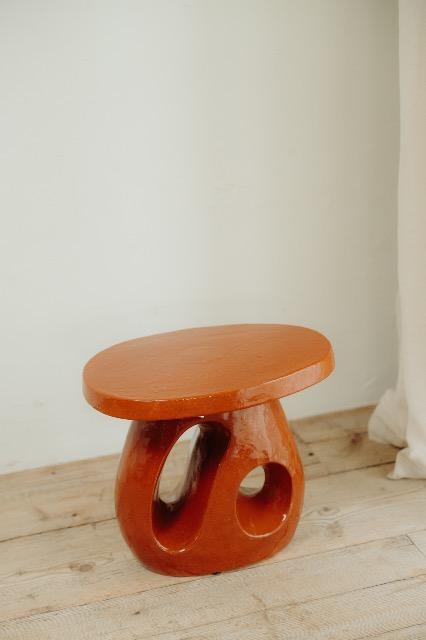 red glazed ceramic side table ...