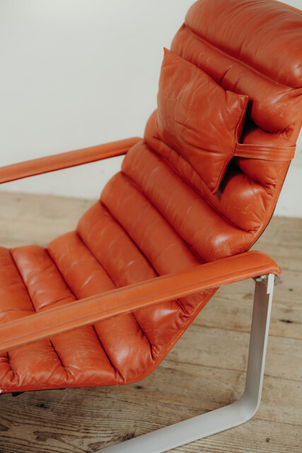 red leather lounge chair and ottoman by Ilmari Lappalainen ..