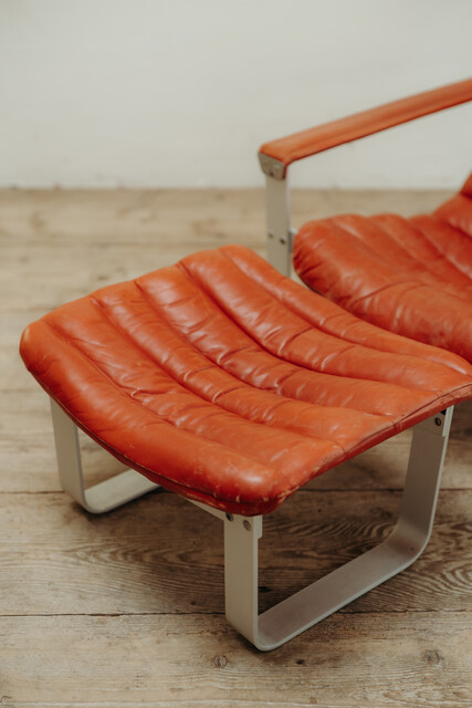 red leather lounge chair and ottoman by Ilmari Lappalainen ..