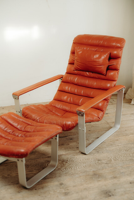 red leather lounge chair and ottoman by Ilmari Lappalainen ..