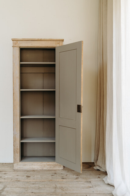 rests of old blue paint on this Spanish pinewood cabinet...
